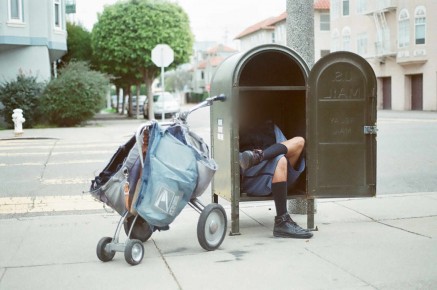 sf-postman-napping-in-mailbox