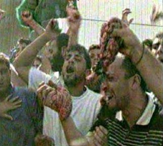 Arabs_waving_entrails_of_butchered_Israelis_in_Ramallah