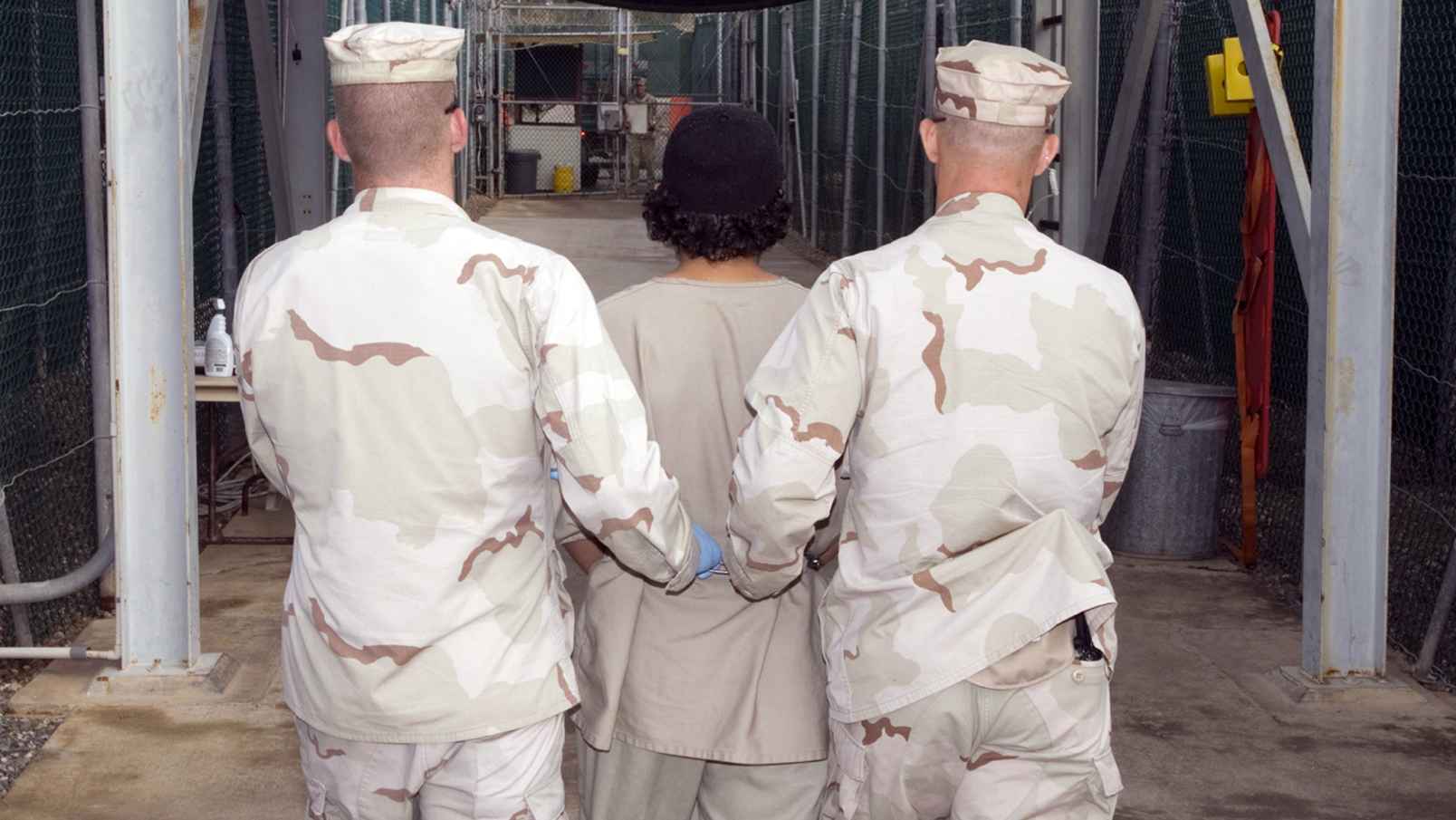 captive_being_escorted_for_medical_care_december_2007